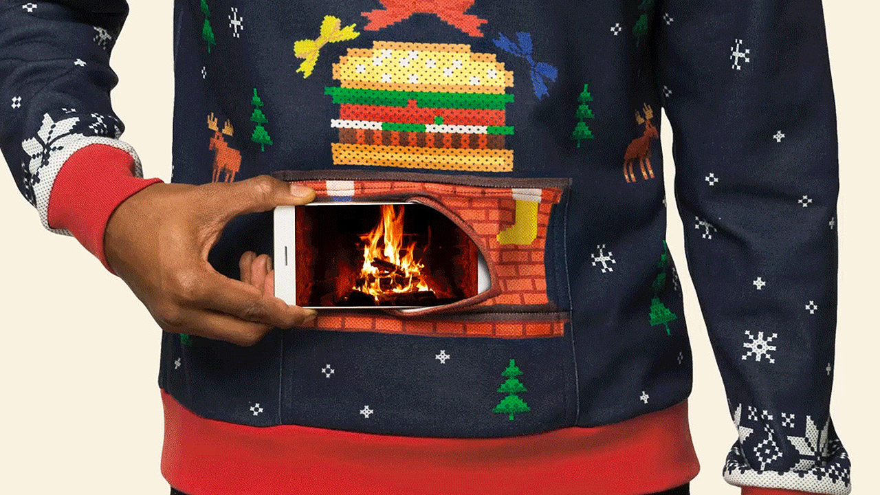 Burger King’s coole aber unglaublich hässliche Weihnachtspullover haben Platz für ein Handy!